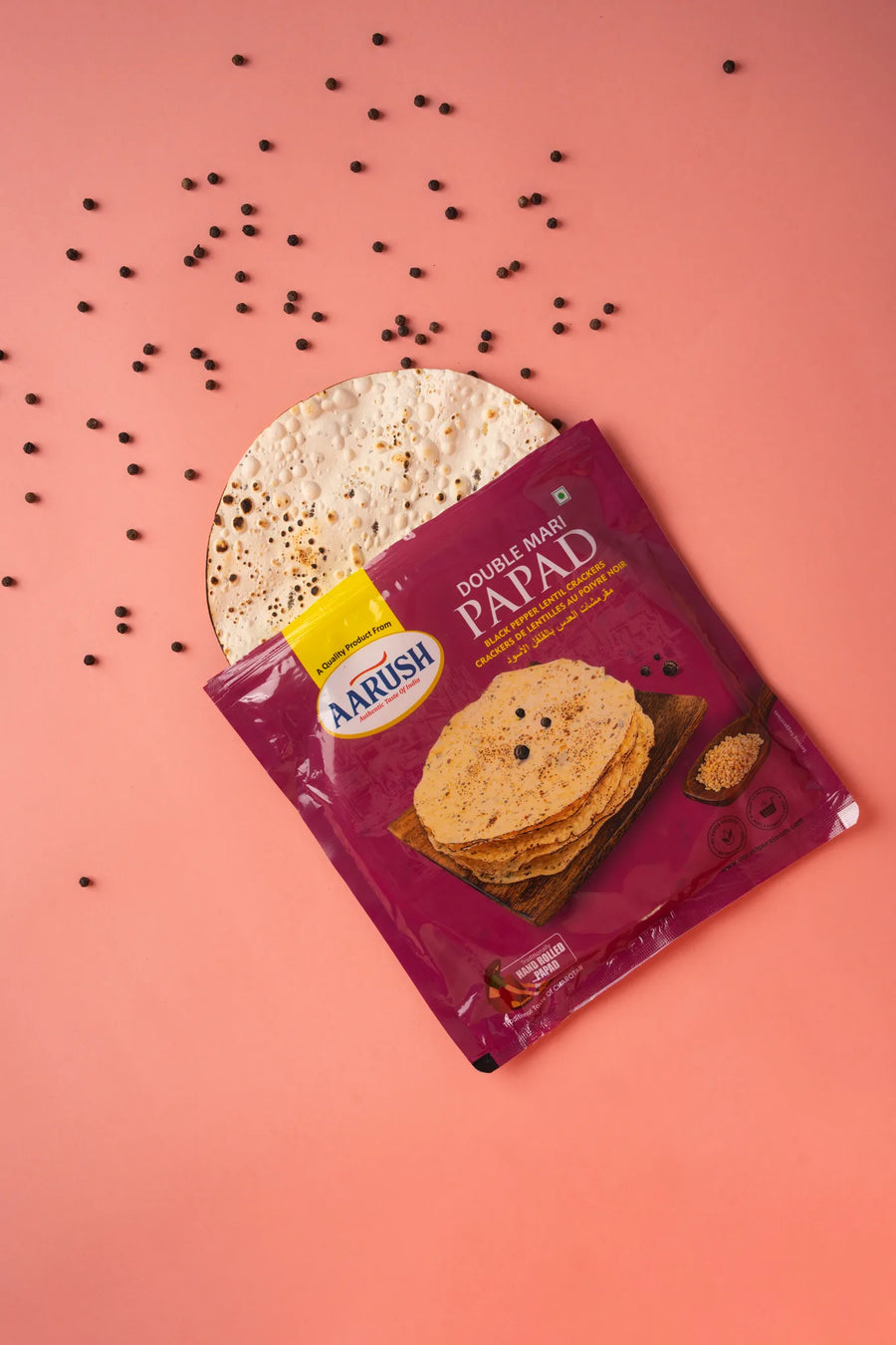 Papad with a <i>black pepper</i> bite.